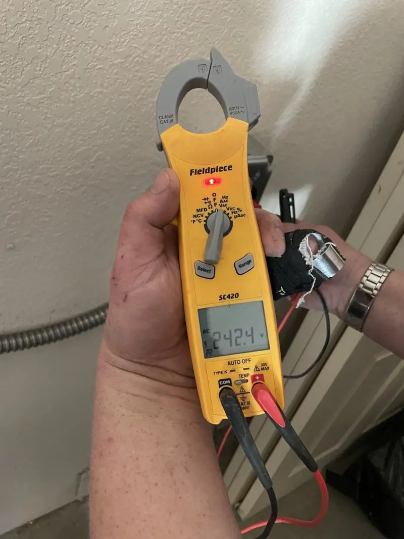 Voltage testing with clamp meter during Generator Installation in Gladeview